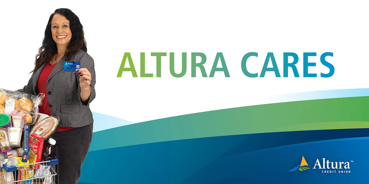 Altura Credit Union member with grocery cart of donated food promoting the Altura Cares program.