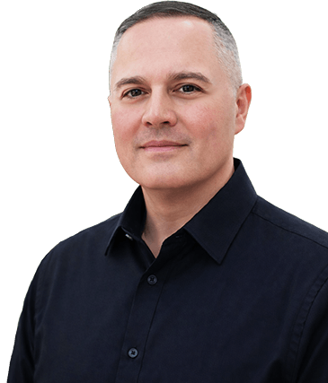 Photo of a man wearing a black dress shirt